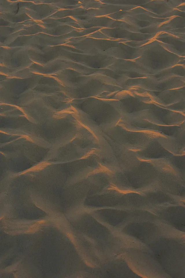 Wind patterns across sand dunes